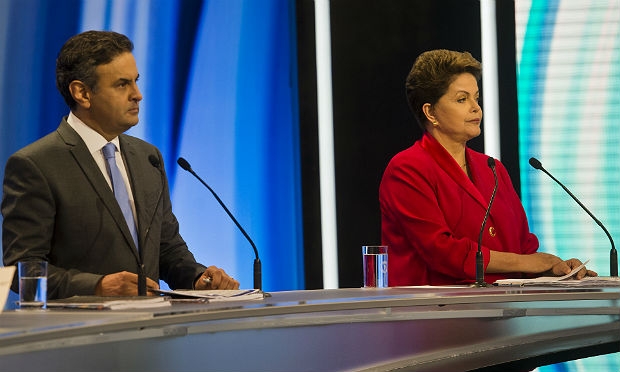 Dilma está com 40,91% dos votos válidos, e Aécio Neves com 34,38% / Foto: AFP