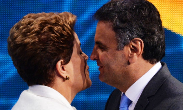 Nos últimos dias, o PT tem tentado passar a imagem de que Aécio está criticando a presidente Dilma porque ela é mulher / Foto: AFP