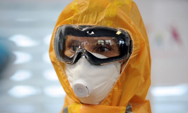 Levantamento feito pela OMS também leva em consideração os profissionais de saúde que atendem infectados.  / Foto: AFP