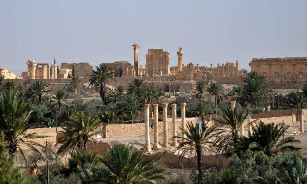 A conquista do posto de fronteira e da cidade histórica de Palmira, fizeram com que a milícia chegasse ao controle de metade da Síria, enquanto o regime tem apenas 22%. / Foto: STR / AFP