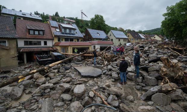 Em Braunsbach, norte da região, um rio transbordou e provocou inundações, que atingiram várias casas, segundo a agência DPA. / Foto: Marijan Murat / DPA / AFP