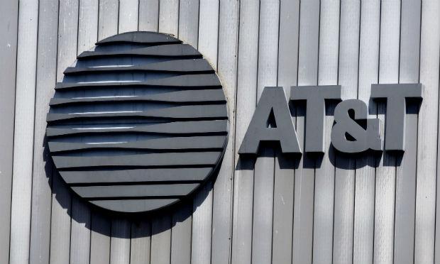 Acordo prevê que a AT&T absorva a dívida do grupo / Foto: AFP